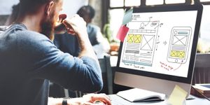 A web developer working on designing a website