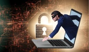 A hacker trying to steal data from office laptop