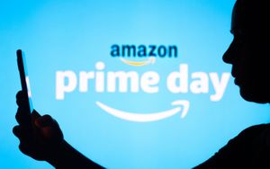 Image shows a woman holding a smart phone with Amazon Prime Day logo in the background