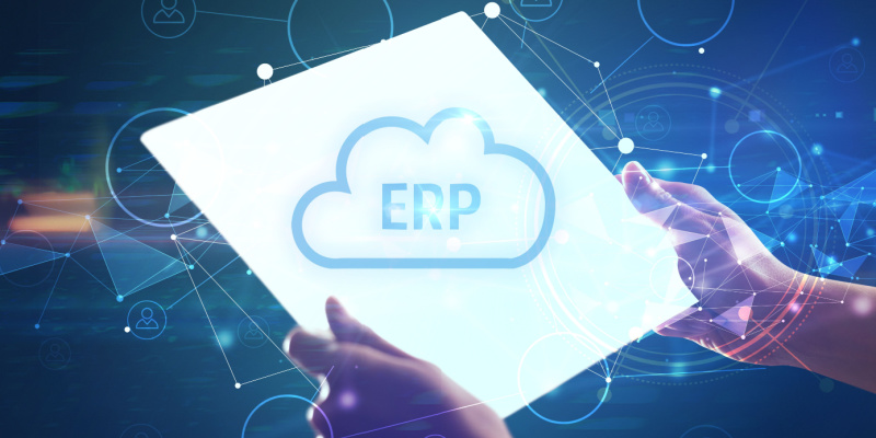 Image showing a hand holding a tablet with ERP written in a cloud